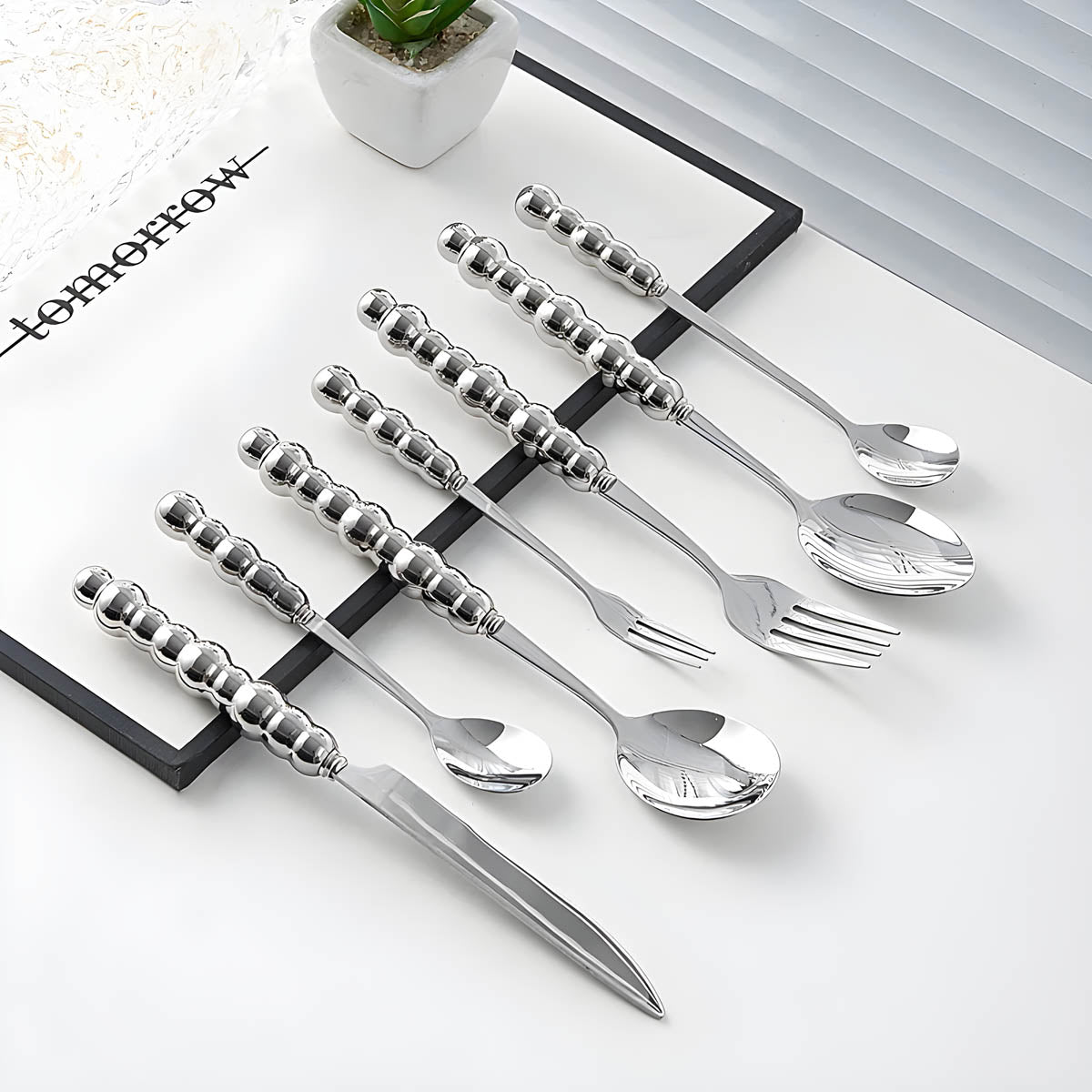 Kestrel Curve Stainless Steel Flatware Set — gallery image 9